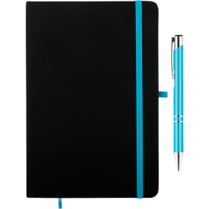 A black notebook with a turquoise elastic band and a matching turquoise pen placed beside it. The notebook has a logo.