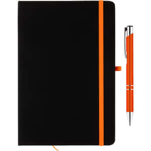 A black notebook with an orange elastic band and an orange-accented silver pen. The pen has a sleek, modern design.