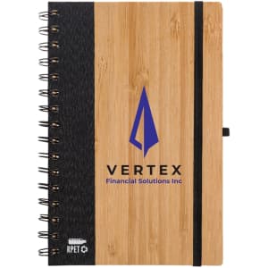 A spiral-bound notebook with a wooden bamboo cover and a black spine, featuring a logo on the front.