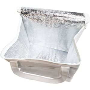 A white cooler bag with a silver insulated interior and sturdy handles. It has a simple design and a logo.