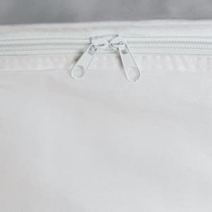 A white cooler bag featuring double zipper closures. The material appears durable and water-resistant.