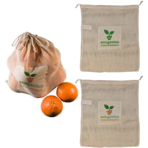 A reusable mesh produce bag in natural color, containing oranges, with logos on the bag. Two additional bags are displayed.