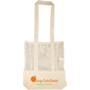 A cream tote bag with mesh sides and a logo at the bottom featuring an orange graphic.