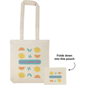 An off-white tote bag with a fruit design and a logo. It folds into a small pouch for easy storage.