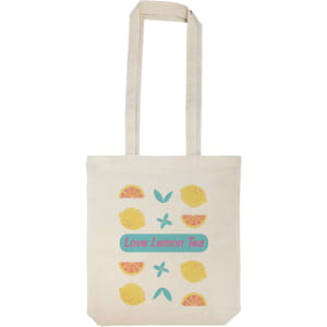 A cream-colored tote bag featuring lemon and tea-themed designs with pastel colors and a logo.