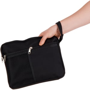 A black utility pouch with a zippered compartment and a mesh pocket, held by a hand. It has a hand strap.
