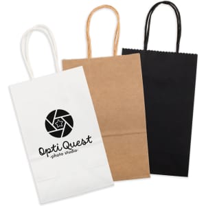 A set of three small paper bags in white, brown, and black, featuring handles and a logo on one bag.