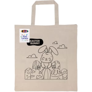 A calico bag featuring a black and white colouring design of an Easter bunny amidst decorated eggs, with a handle.