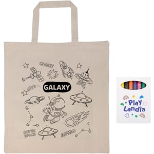 A beige calico bag featuring space-themed designs and a box of colorful crayons beside it. The bag has short handles.