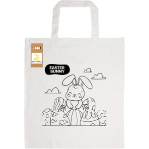 A cotton bag featuring a colouring design of an Easter bunny with decorative eggs. The bag is cream in colour and has a logo.