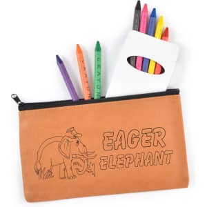 A brown zippered pouch contains colorful crayons and a white paper holder with additional crayons. A logo is visible.