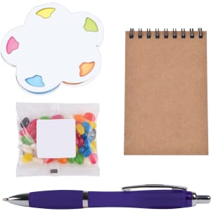 A purple pen, a brown notepad, colorful sticky notes, and a bag of jelly beans.