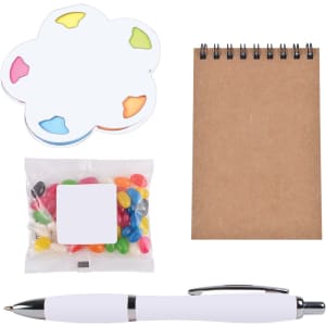 A set of colorful sticky notes shaped like a flower, a small notepad, a bag of jelly beans, and a white pen.
