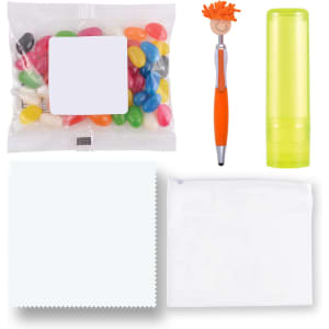 An assortment of colorful jelly beans, an orange and silver pen, a lime green lip balm, a white cloth, and a clear pouch.