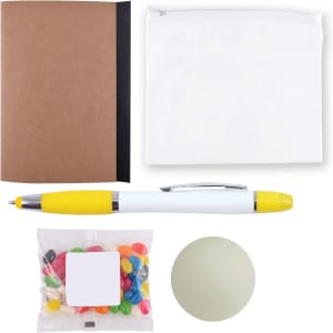 A brown notebook, a white pouch, a yellow and white pen, a container of colorful jelly beans, and a green stress ball.