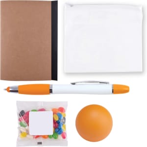 A notebook, a pen, a pouch, a stress ball, and a bag of jelly beans.