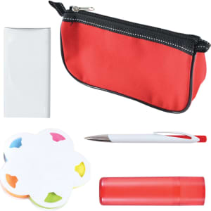 A red pouch containing a notepad, a pen, a set of colorful sticky notes, and a red lip balm.