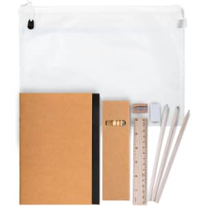 A clear pouch containing a notebook, sharpener, eraser, ruler, and pencils in neutral tones.