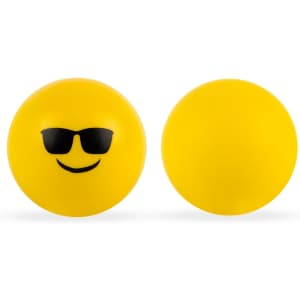 A pair of yellow stress balls featuring a smiling emoji with sunglasses on one side and a plain surface on the other.