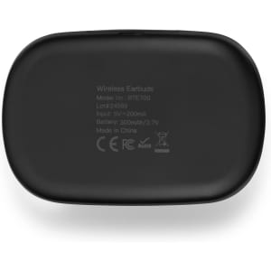 A black charging case for wireless earbuds featuring model information and specifications on the underside.
