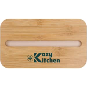 A bamboo lunch box lid with a phone holder slot and branding.