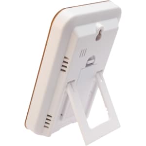 A weather station device with a sleek white design and a foldable stand for easy placement.