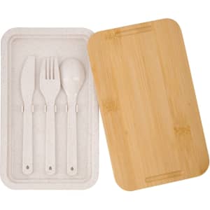 A bamboo lid covers a compartment holding a set of eco-friendly utensils: knife, fork, and spoon in a tray.