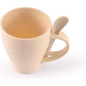A reusable coffee cup made from wheat fiber, featuring a light beige color and a spoon integrated into the handle.
