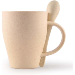 A reusable cup in light beige with a matching spoon, featuring a handle and a textured finish.