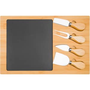 A bamboo cheese board with a slate section and four stainless steel knives with wooden handles.