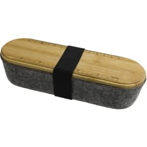 A gray utility case with a wooden lid featuring a ruler design, secured by a black strap.
