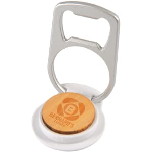 A drink bottle opener in silver with a wooden base and a white circular holder. Features a logo on the wooden part.