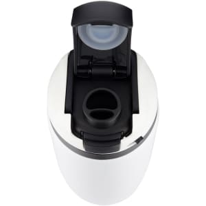 A drink bottle in white with a black lid, featuring a flip-top spout and a built-in straw opening.