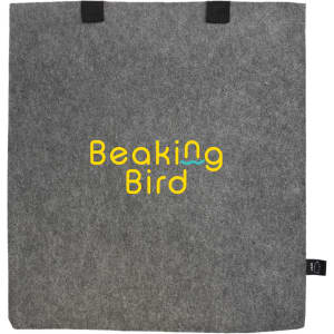 A grey felt tote bag with black handles and a logo prominently displayed in yellow and blue.