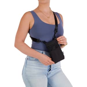 A black neck pouch with adjustable straps, held by a person, featuring multiple pockets for storage.