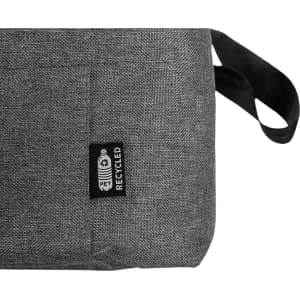 A gray cooler bag with a textured surface and a small logo tag, featuring a black handle.