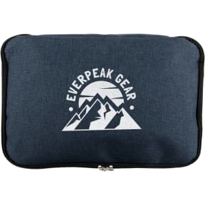 A navy cooler bag with a mountain logo. Features a zip closure and a compact, rectangular design.