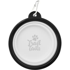 A black and white collapsible pet bowl with a logo, featuring a carabiner for easy attachment.