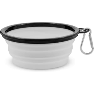 A collapsible bowl in white with a black rim, featuring a carabiner for easy attachment.