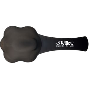 A black pet food scoop with a paw-shaped scoop head and a handle, featuring a logo.