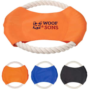 An orange toy with a rope handle, featuring a logo, alongside blue and black versions of the same design.