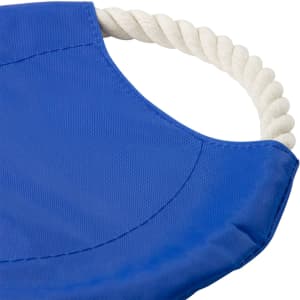 A blue dog toy with a textured surface and a white rope handle. It features a branding logo.