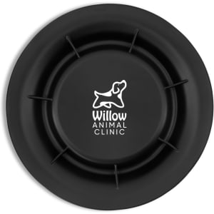 A black pet bowl with a circular design and a central logo featuring a dog.