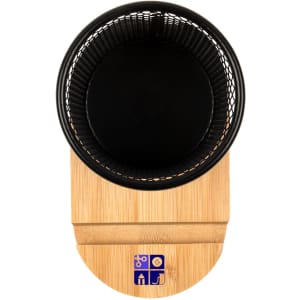 A bamboo pen tidy phone stand with a black mesh top and a light bamboo base. It features a small logo.