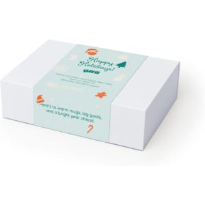 A white gift box featuring a light blue label with holiday-themed illustrations and a festive message.