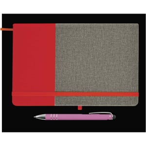 A red and gray notebook with an elastic band and a matching pink pen positioned beside it.