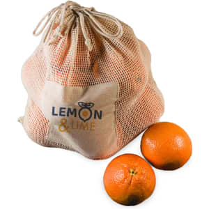A beige mesh bag filled with oranges, with two oranges placed beside it. The bag features a logo.