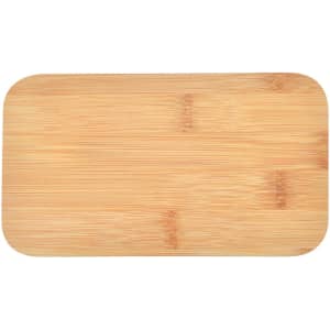 A rectangular bamboo cutting board with a smooth surface and rounded edges, featuring a natural wood grain pattern.