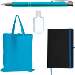 A blue tote bag, a black notebook with a blue ribbon, a turquoise pen, and a small bottle of hand sanitizer.