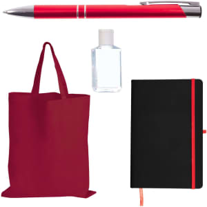 A red tote bag, a silver and red pen, a clear hand sanitizer bottle, and a black notebook with an orange elastic band.